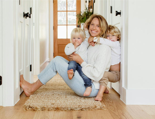 woman holding her babies