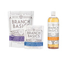 A bottle of Branch Basics Concentrate, a pouch of Dishwasher Tablets, and a pouch of Laundry Detergent are displayed on a white background.