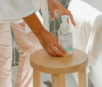 A single Plastic Foaming Bottle placed on a wooden stool. - Thumbnail View 9
