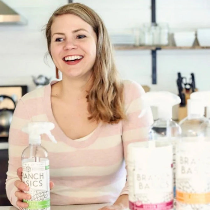 Customer in a kitchen with Branch Basics products