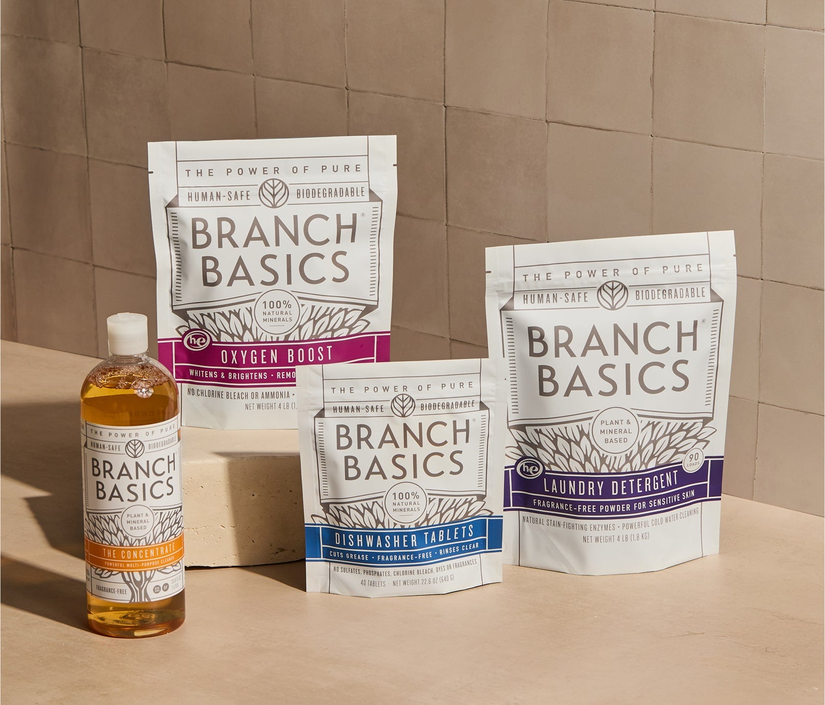 The Best Sellers Bundle displayed on a beige surface with a tiled wall background. - View 1
