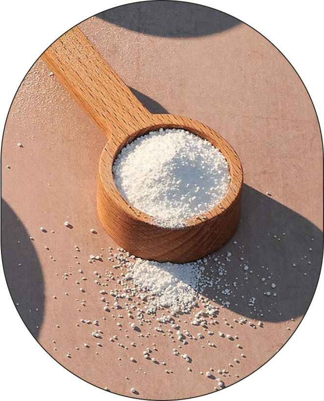 A bowl of Sodium Percarbonate, positioned against a neutral background with thrown shadows. - Card 1