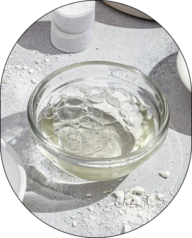 A small, clear bowl containing Sodium Lauryl Sulfoacetate, positioned against a neutral background. - Card 2