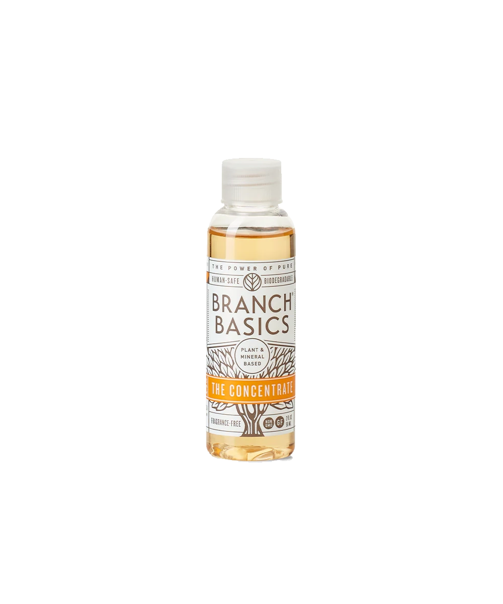 A mini-bottle of the Branch Basics Concentrate, displayed on a transparent background.
