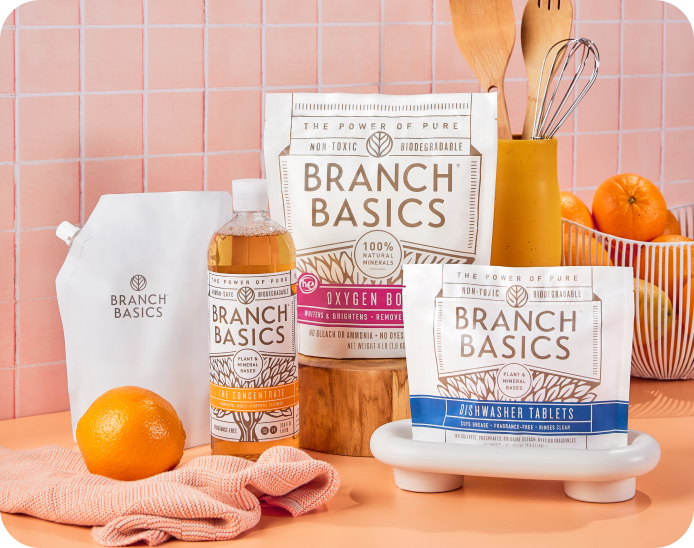 A collection of Branch Basics refill products sitting on a kitchen counter. 