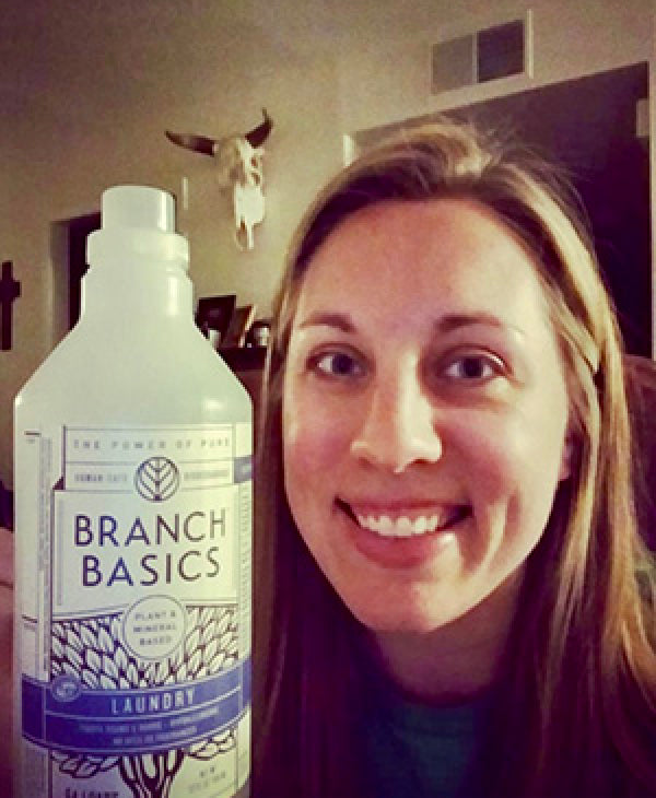 Customer smiling with a Branch Basics product