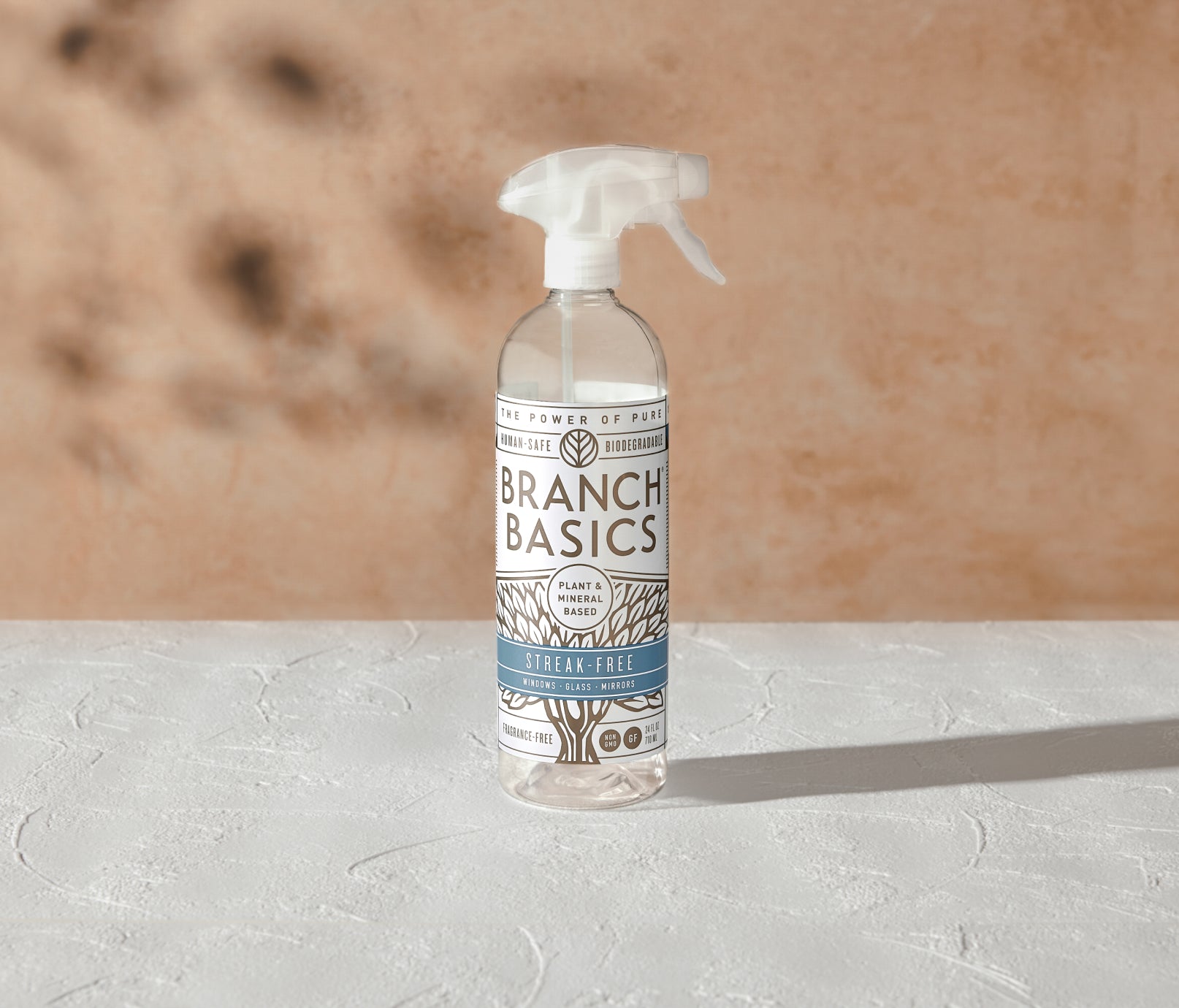 A refillable Plastic Streak-Free bottle, used to dilute and dispense Branch Basics Concentrate with water, displayed on white surface and neutral background. - View 2
