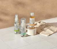The Travel Kit, featuring mini-versions of the Branch Basics Concentrate, All-Purpose spray, and Foaming Wash pump, displayed on a neutral background. - Thumbnail View 2
