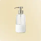 Branch Basics Glass Foaming Wash Bottle on a beige background