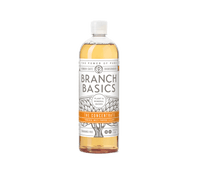 A plastic bottle of Branch Basics Concentrate cleaning solution with a white label and tree graphic. - Thumbnail View 1
