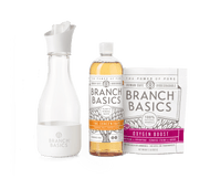 The Laundry Kit featuring a refillable Glass bottle, displayed on a transparent background. - Thumbnail View 1
