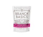 A pouch of Branch Basics Oxygen Boost, designed for laundry, stain and grout cleaning.