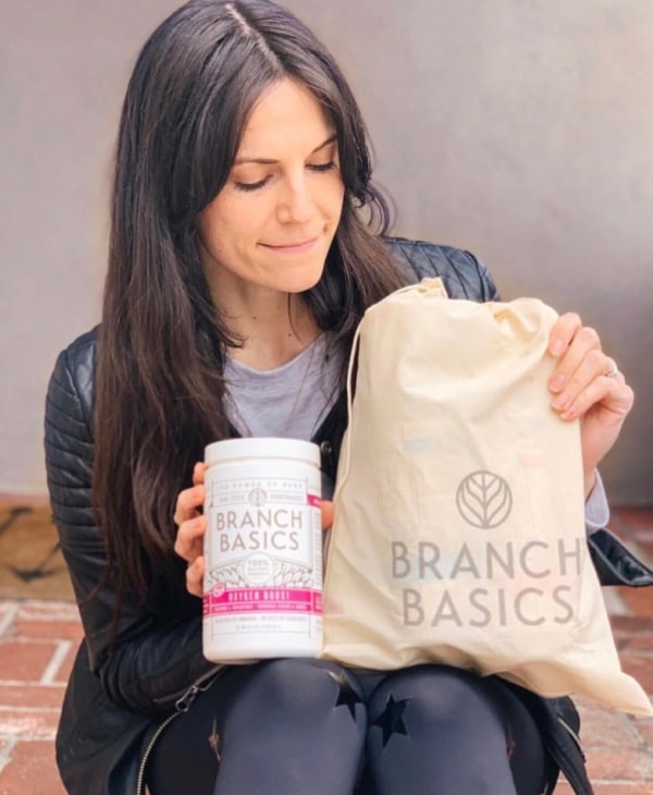 Customer holding a Branch Basics starter kit