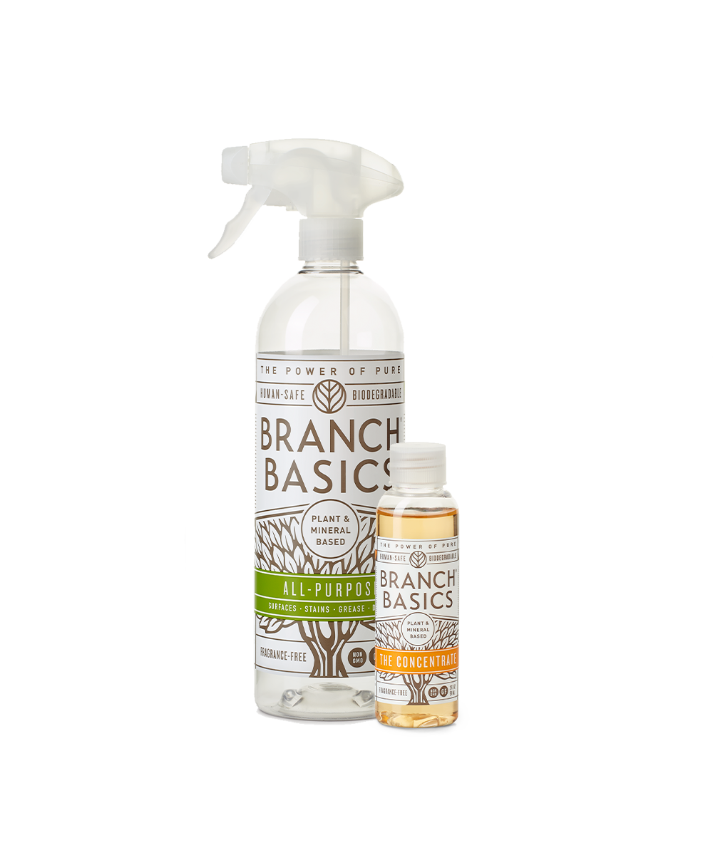 The Trial Kit featuring a refillable Plastic bottle and a mini-bottle of Branch Basics Concentrate, displayed against a transparent background. - View 1
