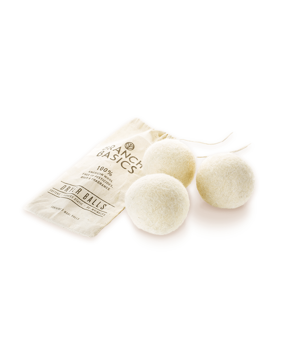 A trio of Wool Dryer Balls accompanied by a cloth carrying bag, displayed on a transparent background. - View 1
