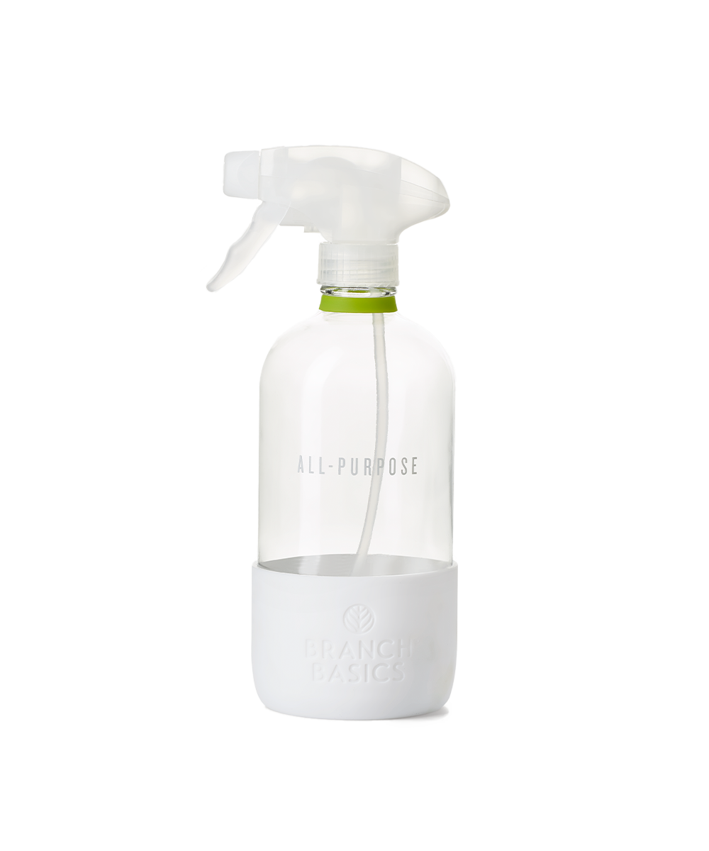 A refillable Glass All-Purpose bottle, used to dilute and dispense Branch Basics Concentrate with water, displayed on a transparent background. - View 1

