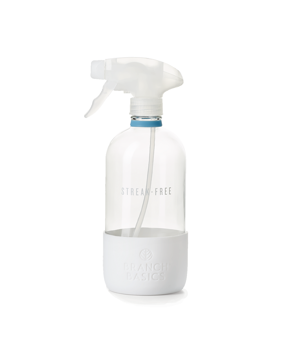 A refillable Glass Streak-Free bottle, used to dilute and dispense Branch Basics Concentrate with water, displayed on a transparent background. - View 1
