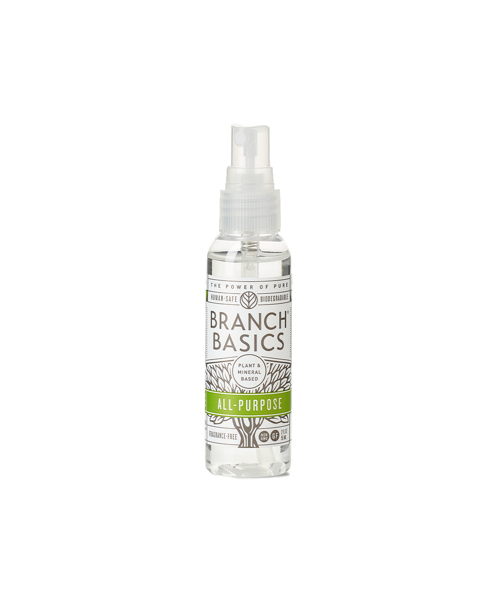 A mini-bottle of the Branch Basics All-Purpose spray, displayed on a transparent background. - View 1
