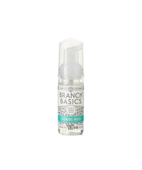 A mini-bottle of the Branch Basics Foaming Wash dispenser, displayed on a transparent background. - Thumbnail View 1
