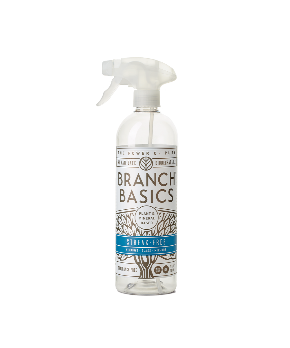 A refillable Plastic Streak-Free bottle, used to dilute and dispense Branch Basics Concentrate with water, displayed on a transparent background. - View 1
