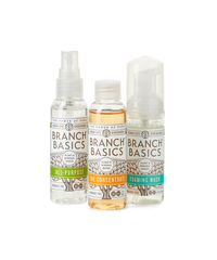 The Travel Kit, featuring mini-versions of the Branch Basics Concentrate, All-Purpose spray, and Foaming Wash pump, displayed against a transparent background. - Thumbnail View 1
